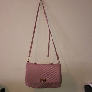 Bebe blush colored purse.